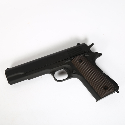 28 - A replica Colt 1911 BB pistol, length 20cm