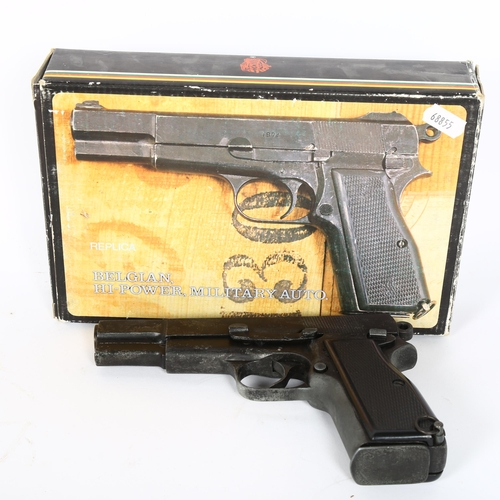34 - A replica Belgian pistol, boxed