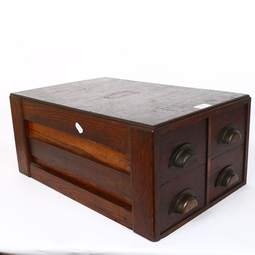 59 - A bank of 4 stained oak and pine workshop drawers, W35cm, H23cm, D51cm