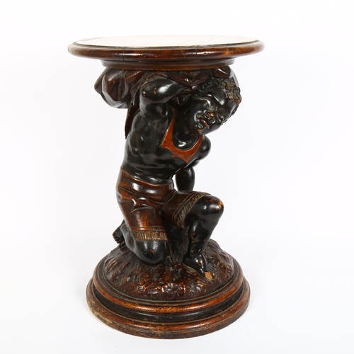 9 - A 19th century carved and stained oak Blackamoor figure pedestal, height 50cm, diameter 34cm