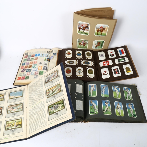 94 - Vintage postage stamp and cigarette card albums (5)