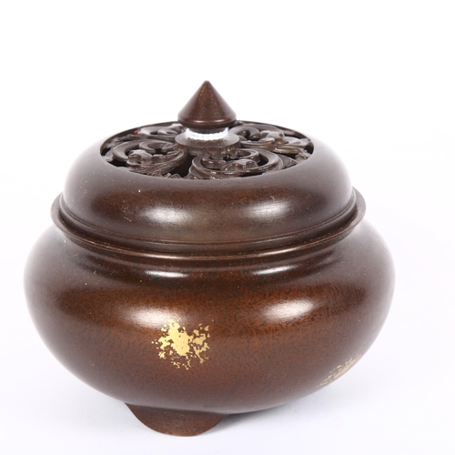 138 - A Chinese gold splashed patinated bronze censer and cover, marks on base, diameter 10cm