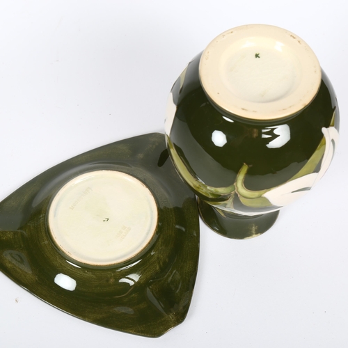 144 - MOORCROFT - a matching Bermuda Lily pattern ovoid vase and ashtray, vase height 14cm (2)