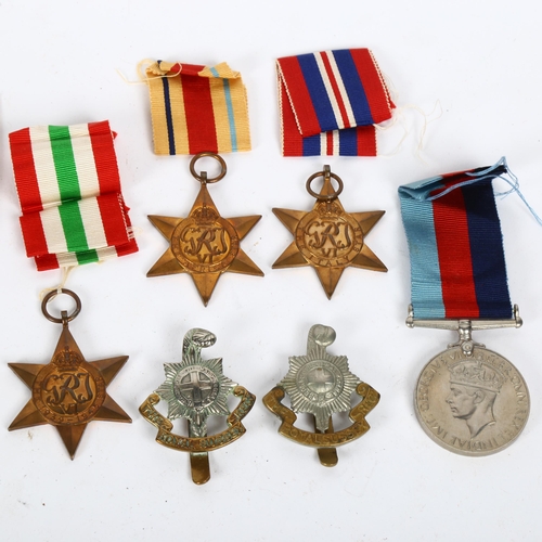 156 - A group of 4 Second World War Service medals, unnamed, comprising 1939 - 45 Star, Africa Star, Italy... 