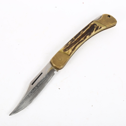 173 - A 910 Puma Prince staghorn-handled hunting knife, serial no. 12871, blade length 9.5cm
