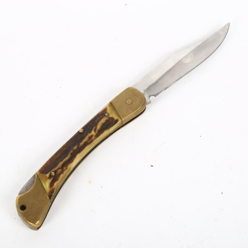 173 - A 910 Puma Prince staghorn-handled hunting knife, serial no. 12871, blade length 9.5cm