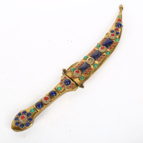 182 - A Turkish stone set brass dagger and scabbard, blade length 12cm