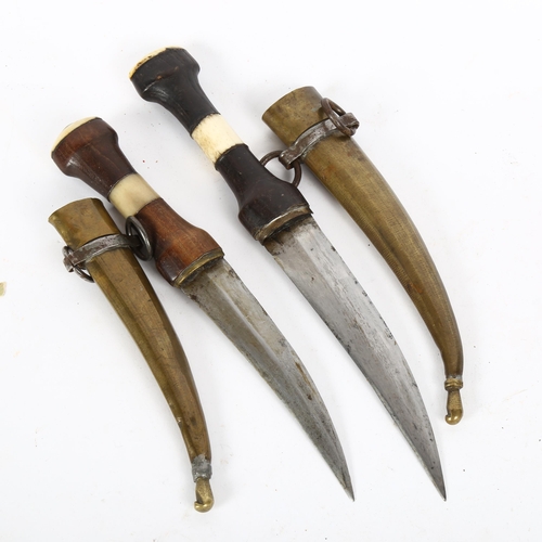 183 - 2 Middle Eastern bone-handled daggers, with brass scabbards, blade length 15cm