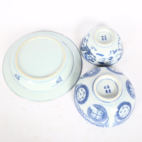 203 - A Chinese blue and white dragon bowl, chrysanthemum dish, and another, largest diameter 22cm (3)