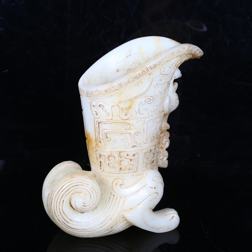 212 - A Chinese white jade libation cup, with phoenix decoration, height 18cm