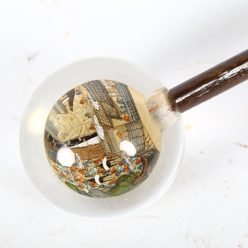 221 - A Chinese walking stick with internally painted glass globe handle, handle diameter approx 7.5cm