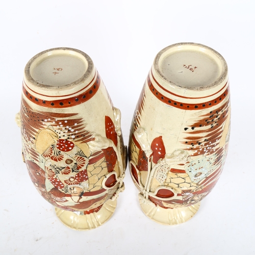 223 - A pair of Japanese Kutani pottery vases, height 31cm