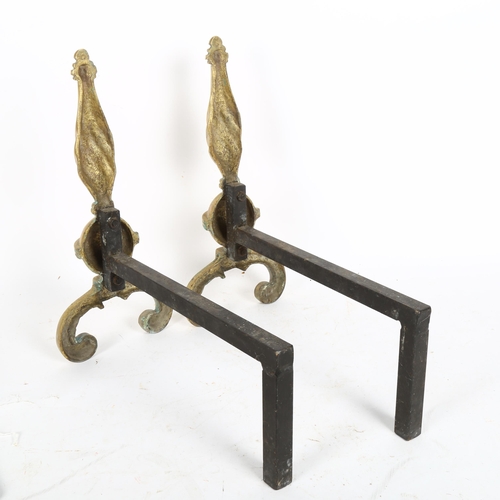 245 - A pair of cast-brass fire dogs, height 37cm