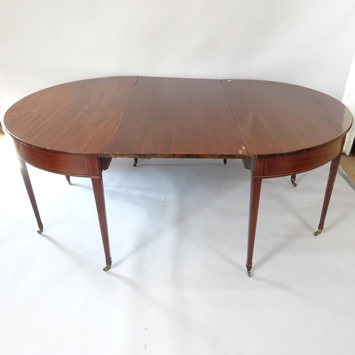 2061 - A Georgian mahogany and satinwood-strung D-end dining table, with spare leaf, 185cm (extending to 24... 