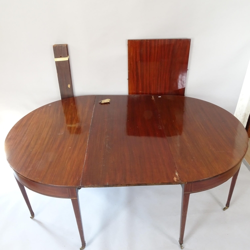 2061 - A Georgian mahogany and satinwood-strung D-end dining table, with spare leaf, 185cm (extending to 24... 