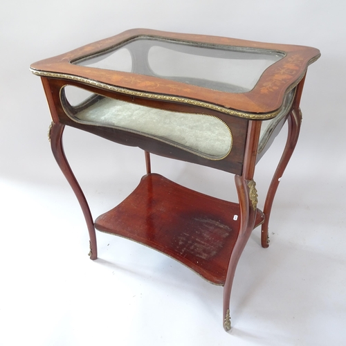 2064 - A Victorian mahogany rectangular vitrine table, with inlaid decoration, glazed panels and under tier... 