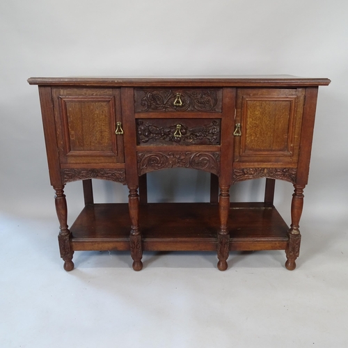 2066 - A 19th century oak sideboard, with 2 fitted drawers and cupboards, and chip carved decoration