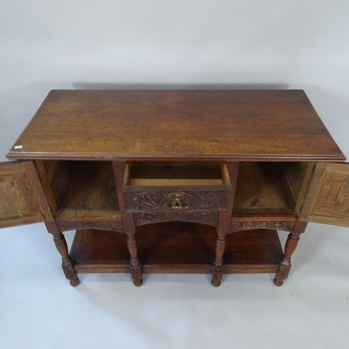 2066 - A 19th century oak sideboard, with 2 fitted drawers and cupboards, and chip carved decoration