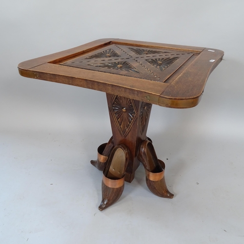 2067 - A carved oak square-top occasional table, with clog-shaped feet, 55cm x 58cm