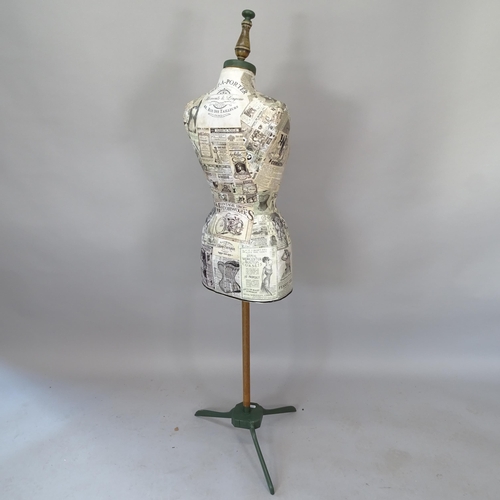 2071 - A shop display mannequin on stand, with applied decoupage decoration, 158cm