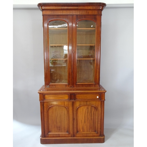 2081 - A Victorian mahogany library bookcase, with 2 glazed doors, 2 fitted drawers and 2 panelled cupboard... 