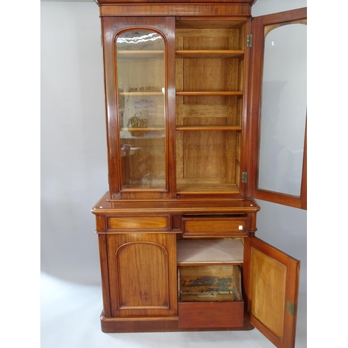 2081 - A Victorian mahogany library bookcase, with 2 glazed doors, 2 fitted drawers and 2 panelled cupboard... 