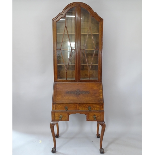 2082 - A Victorian oak bureau bookcase, with 2 lattice-glazed doors and fall-front revealing a fitted inter... 