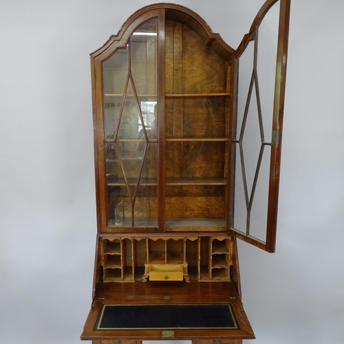 2082 - A Victorian oak bureau bookcase, with 2 lattice-glazed doors and fall-front revealing a fitted inter... 