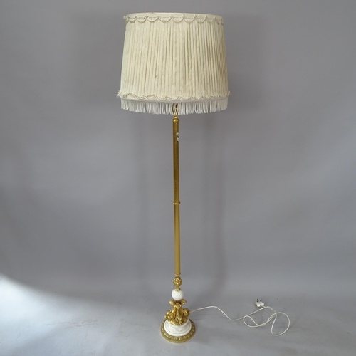 2084 - A French Empire style brass standard lamp and shade, with dolphin decoration to base, height overall... 