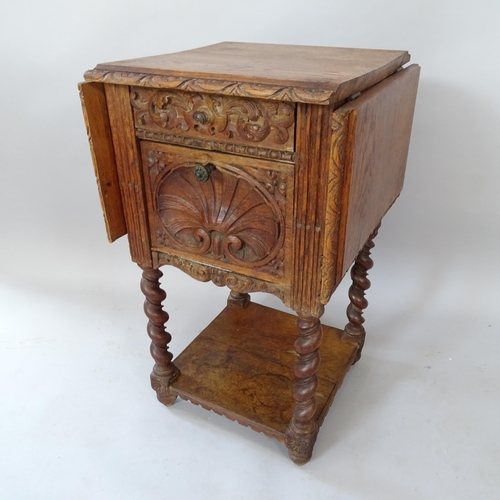 2089 - A Victorian oak pot cupboard, with drop leaves and carved acanthus leaf and shell decoration, on spi... 