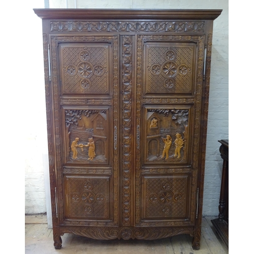 2092 - A Bretton French oak 2-door armoire, with allover carved decoration and shelved interior, 145cm x 20... 