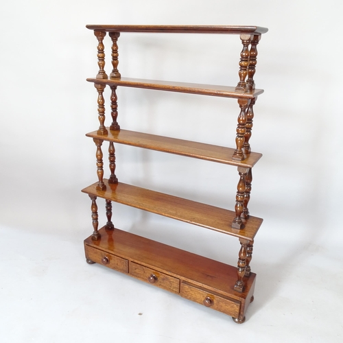 2111 - A Victorian mahogany 5-tier Etagere, with 3 fitted drawers and oak shelves, with bun feet, 85cm x 11... 