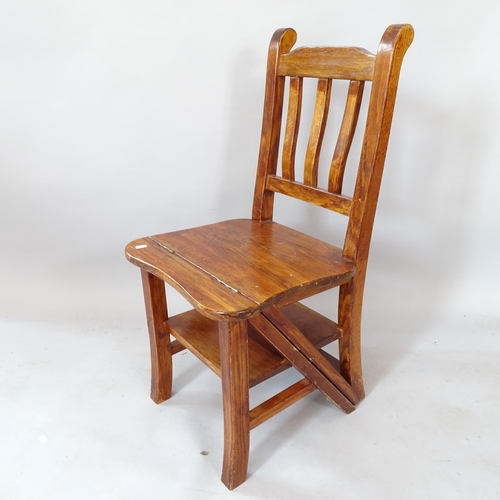 2115 - A reproduction metamorphic library step chair