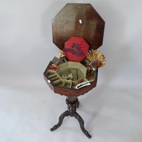 2123 - A Regency rosewood octagonal work table, with fitted interior, on tripod base, 42cm x 78cm