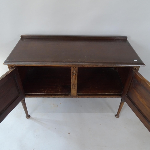 2136 - A 1920s oak sideboard, with raised back and 2 panelled doors, 106cm x 76cm x 44cm