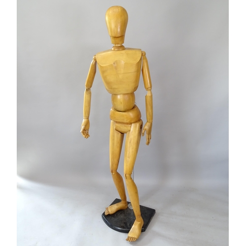 2139 - A posable wooden artist's mannequin on stand, 185cm