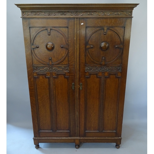 2180 - A Victorian Arts and Crafts 2-door wardrobe, 138cm x 197cm x 56cm