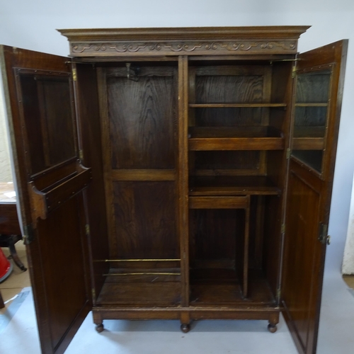 2180 - A Victorian Arts and Crafts 2-door wardrobe, 138cm x 197cm x 56cm