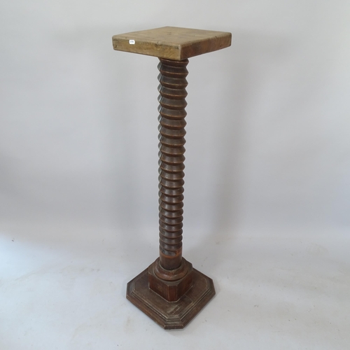 2186 - A French oak spiral turned pedestal, 38cm x 126cm