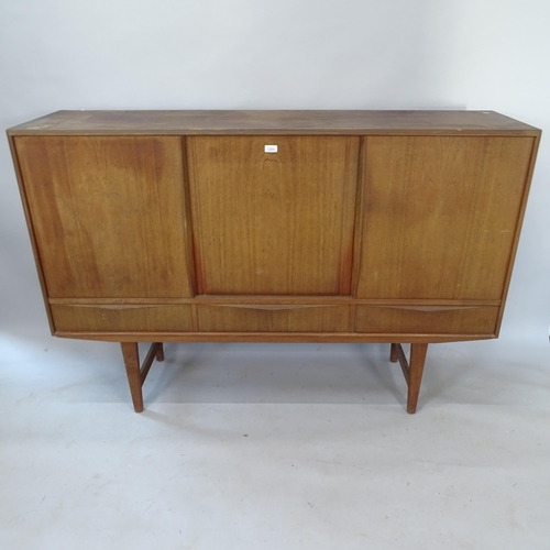 2193 - E.W.Bach for Sejling Skabe. A mid-century teak sideboard, with 3 sliding doors, L170cm, H113cm, D43c... 