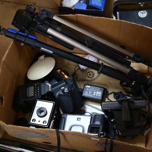 267 - A quantity of Vintage cameras and other accessories, to include 3 tripods, a Canon C-8 grip cine cam... 