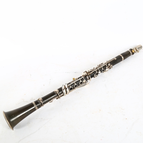 282 - A Chinese Hsinghai 4-section clarinet, cased