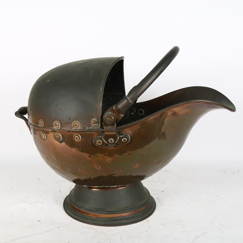 306 - A copper swing-handled coal scuttle, length 50cm