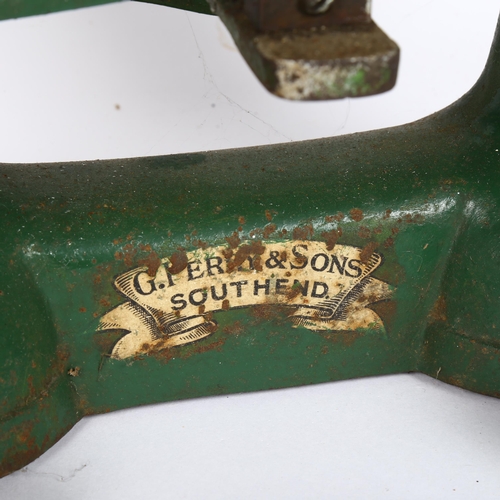 313 - A set of green cast-iron balance scales, by G Perry & Sons of Southend, with a graduated set of cast... 