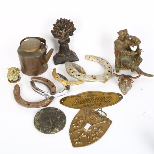 323 - Various collectables, including sundial, horseshoes, cast-iron wheatsheaf doorstop etc