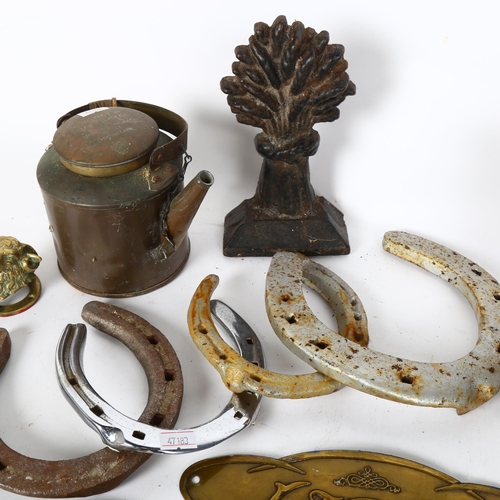 323 - Various collectables, including sundial, horseshoes, cast-iron wheatsheaf doorstop etc