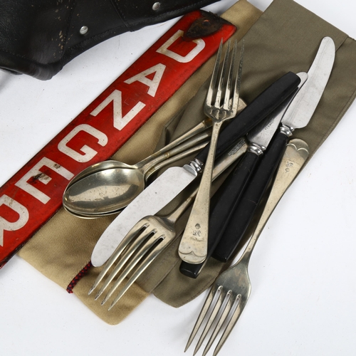 336 - Various militaria, including US M8 bayonet scabbard, red enamel Danger sign, bike seat etc