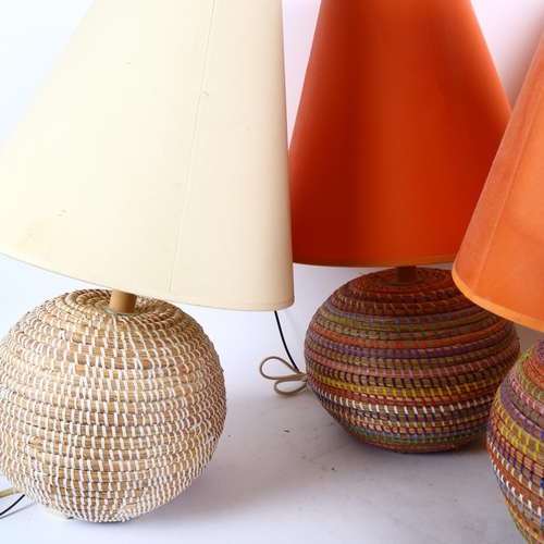 375 - A set of 4 African basket table lamps and shades, overall height 53cm