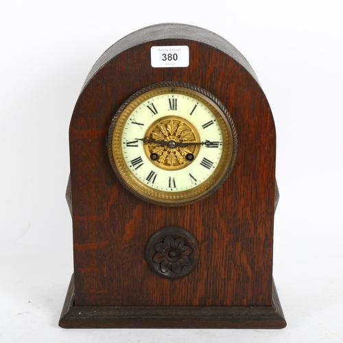 380 - A French oak-cased dome-top mantel clock, by Japy Freres, with gilt and enamel dial, height 32cm