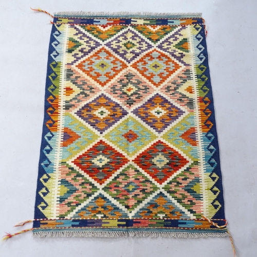 2353 - A Chobi Kilim rug, 121cm x 84cm